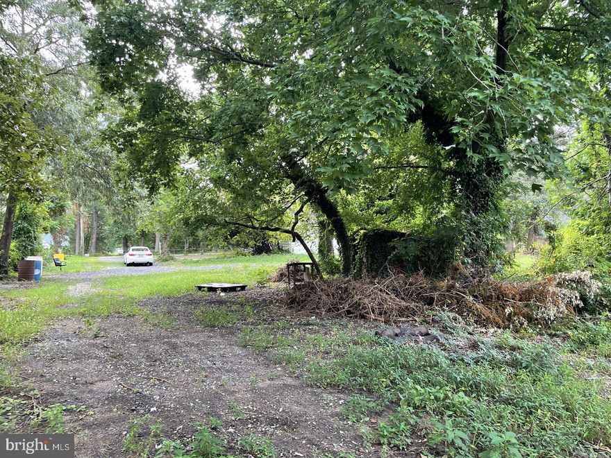 Rarely available two acres zoned R1. There are homes surrounding this priced $500K and higher. Existing house/structures are tear downs. Estate sale so being sold "as is". No contingencies please. Also listed as residential with a few interior pictures. Do not enter the house. The structure is unsafe.  Contact agent before showing and with any questions.