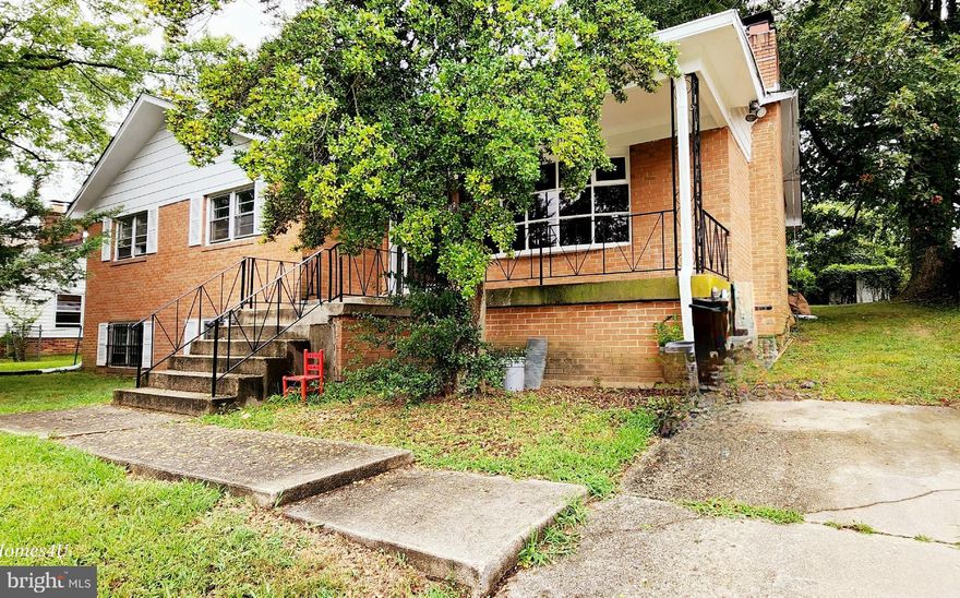 PRICE REDUCED! This home has been renovated with new updated kitchen, bathrooms, & rec room.  Cozy fireplaces in the living room & rec room. Lockbox on front door.  Hardwood floors on the main level. This will not last long.