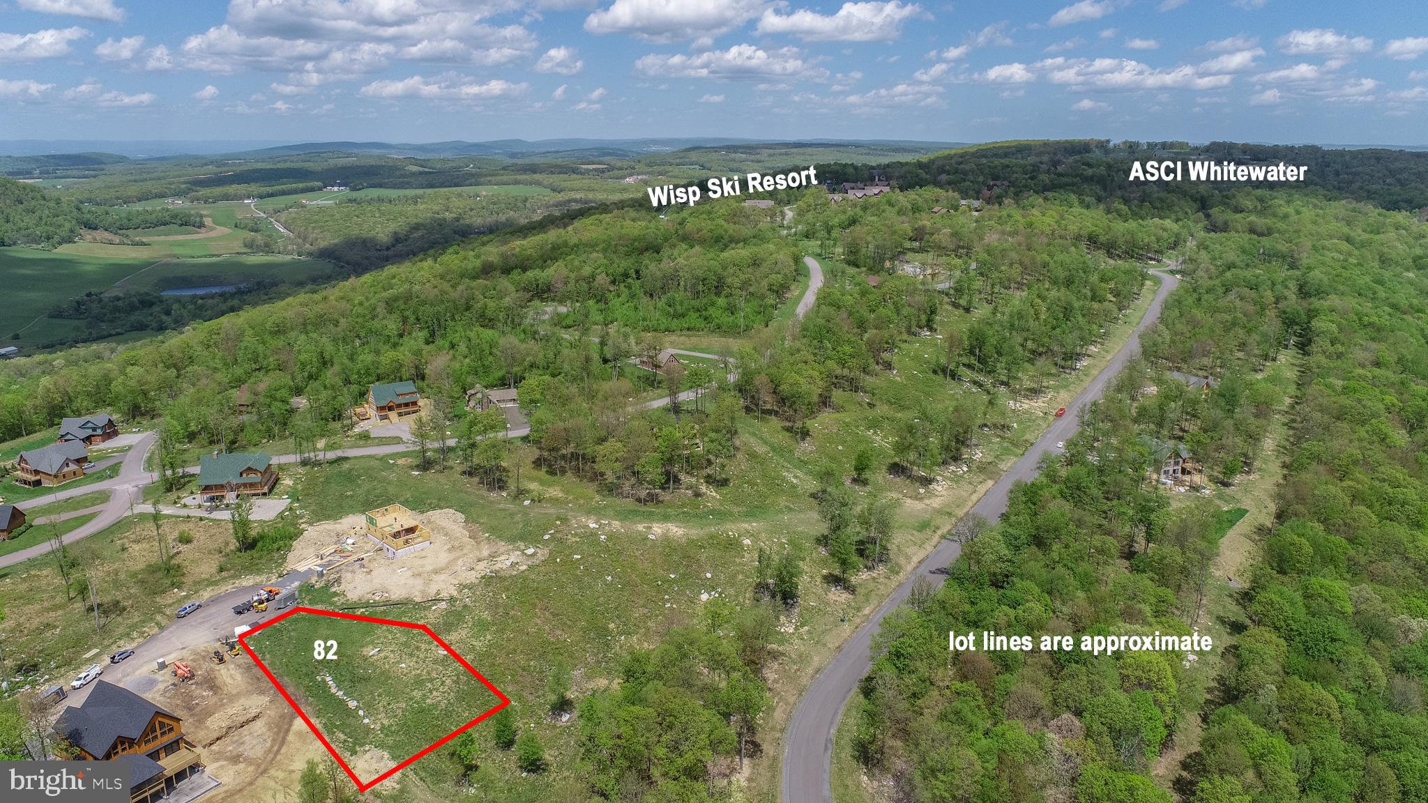 Picturesque building lot at Deep Creek Lake - Located in the booming North Camp Ridge subdivision, this scenic property offers .85 acres of gently sloped building space that drops off the back and opens up some phenomenal southern mountain views! All public utilities to site and ready to build with $6500 sewer tap included. Located less than a mile from Ace's Run and the slopes at Wisp Resort, you're future mountain retreat places you in the heart of everything Deep Creek has to offer. Quiet cul-de-sac, panoramic mountain views, and close proximity to local establishments, state parks, and Deep Creek Lake - the only thing this property lacks is your dream home... Call today to get started!