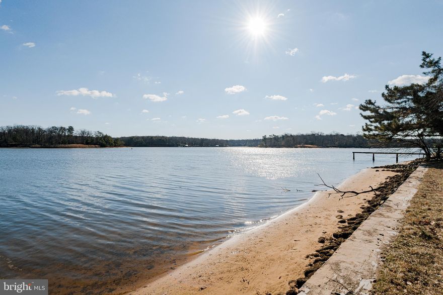 Agents and Guests  Please do not step on the pier it is not stable                               Newly Sub-divided community with 3 homes  and   Community water front .   Sandy Beach and Beautiful View !   Cute Waterfront Cottage!    This home needs some updating but  very livable .   Listing agent has full details.