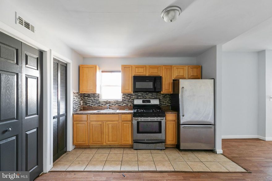 NEW PRICE!! Excellent investment opportunity! Corner lot property in the heart of Point Breeze offering 2 UNITS. First floor unit is used as a Stop and Shop business store front with 7 years left on the lease. The upper floor unit is a 2 bedroom, 1 bathroom fully-renovated apartment currently vacant and ready to lease. Book your appointment today before it's too late!