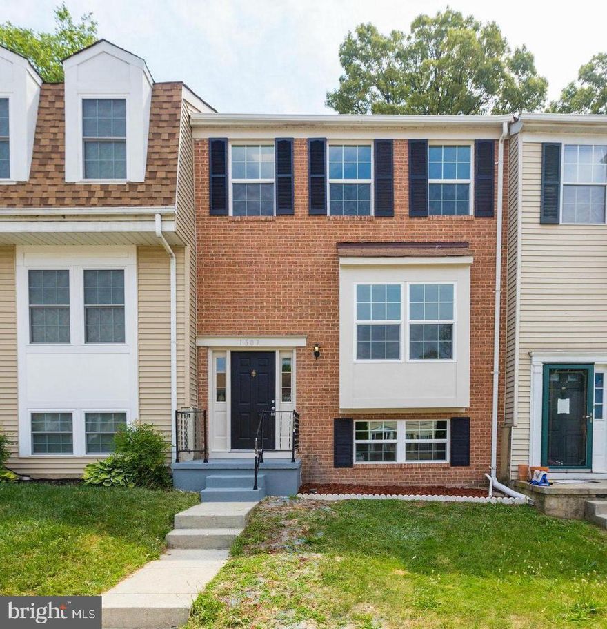 This beautiful brick front townhouse is ready for its new owners. Entering through the front door you will step into the spacious living room with wall to wall hardwood floors and plenty of natural light. Wall to wall Carpet on the top level and basement with granite counter-tops in a modern kitchen. As you continue to walk  you will pass the convenient powder room. The kitchen floors are ceramic with ample cabinet space. Enter the backyard oasis through the sliding glass from the dining area. Moving upstairs to the top floor and to your right you will find the master bedroom which features a closet and a private full en-suite. Down the hall is the second and third bedroom also a full bathroom located in the upstairs hallway with an a bathtub/shower combination. This home is located near all major roadways, and is a short drive to the Metro Blue Line. Text and call for Best Response.