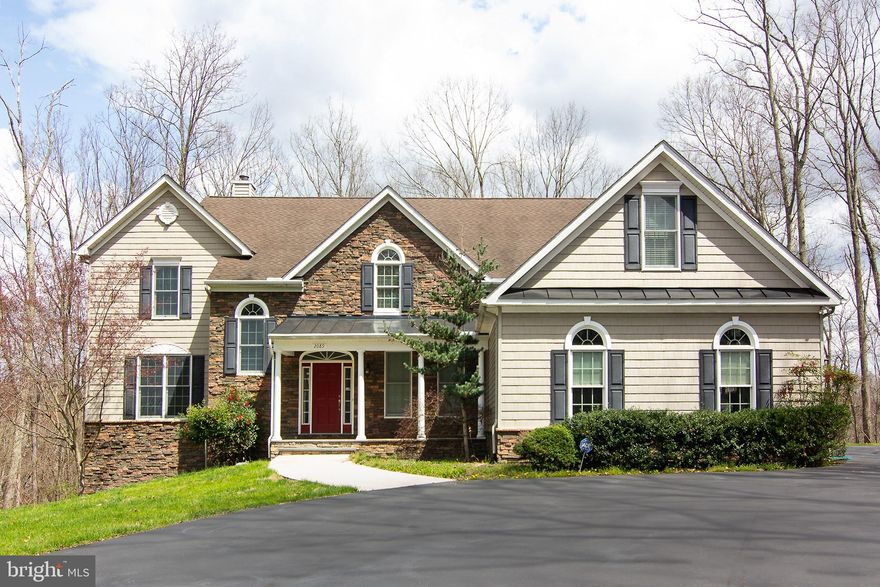 Welcome to your private retreat nestled on a sprawling 18-acre estate in the serene setting of Finksburg. This custom colonial home spans an impressive 6450 square feet, offering luxurious living spaces and unparalleled comfort.

As you enter, you're greeted by the grandeur of this residence, featuring 6 bedrooms and 4 1/2 bathrooms, including a coveted 1st-floor master suite for added convenience and privacy.

The main floor exudes elegance with gleaming Brazilian cherry floors and an open floor plan that seamlessly connects the living spaces. Relax by the cozy gas fireplace in the spacious family room or host gatherings in the large dining room, perfect for entertaining. The open kitchen is a chef's dream, complete with modern appliances, ample counter space, and a large bay window with seating, offering panoramic views of the surrounding landscape.

Step outside to the no-maintenance deck, where you can unwind and soak in the tranquility of the private woods that surround the property.

Upstairs, discover five additional bedrooms, including a massive primary suite that boasts a luxurious 15x16 walk-in closet and a bonus room over the garage with a separate entrance, offering endless possibilities for use.

The lower level of this home is an entertainer's paradise, featuring a sprawling rec room with space for a pool table and unlimited potential for hosting gatherings and events  Oversized 2 car garage with EC charger  Available beginning of May