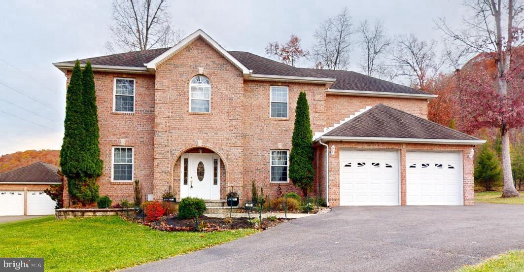 Welcome to this traditional brick 2-story home, nestled in a sought-after neighborhood with easy access to schools, major employers, and regional amenities. This spacious home offers classic charm and modern comforts, blending traditional architecture with thoughtful updates throughout.
Key Features:
• Curb Appeal: Beautifully maintained brick exterior with classic lines, tasteful landscaping, and a welcoming front entry.
• Generous Living Space: Over 3,000 square feet of living space, featuring 4 bedrooms, 3.5 bathrooms, and multiple living areas to accommodate today’s lifestyle.
• Open-Concept Kitchen: Functional kitchen with granite countertops, stainless steel appliances, a large center island, and plenty of cabinet space. Perfect for both everyday meals and entertaining.
• Formal Dining & Living Rooms: Elegant formal dining room and a spacious living room, ideal for hosting guests or enjoying quiet time.
• Cozy Family Room: A large family room with a pellet stove/fireplace, perfect for relaxing and creating lasting memories.
• Primary Suite: A luxurious primary suite featuring a large closet and an ensuite bath with dual sinks, a soaking tub, and a separate shower.
• Outdoor Living: A private backyard with a gazebo, perfect for summer barbecues and outdoor entertaining. Additional Features:
• Hardwood floors throughout the main level
• Laundry on the 2nd level
• Large driveway with ample parking and multiple garage bays
Don’t miss the opportunity to make this your next home! Schedule your showing today!