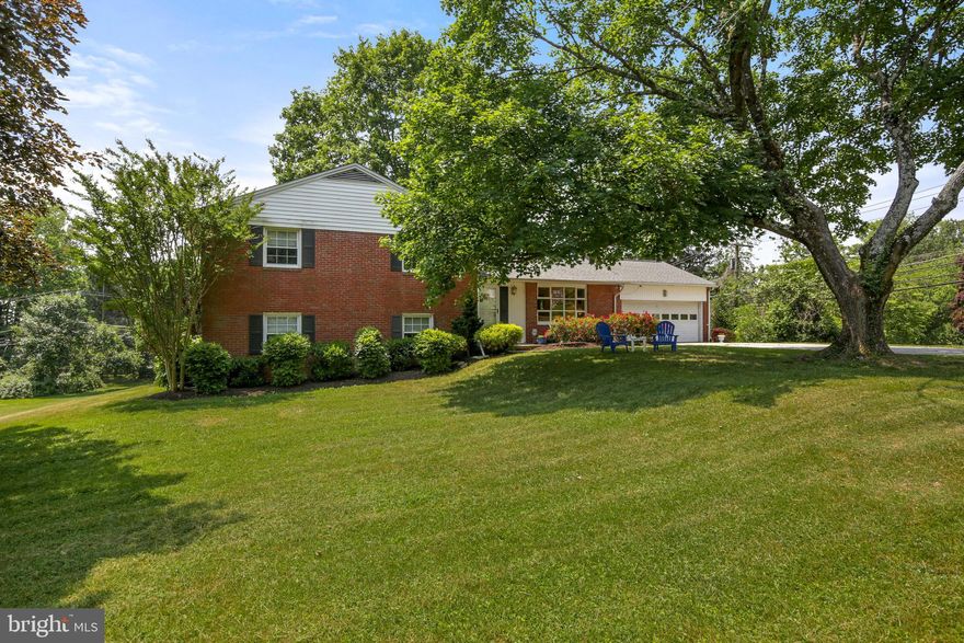 Location! Location! Location! This spacious all brick split-level home sits on a landscaped 1-acre lot.  There are 5 bedrooms, 3 full baths and a gas fireplace in the living room.  Enjoy summer entertaining on the back patio, in the private backyard, or deck off of the kitchen. The walkout family room is drenched with sunlight.  The kitchen has been updated and is equipped with a gas stove, SS appliances, a corner sink and granite counters.  There are beautifully renovated ceramic tile bathrooms. The attached garage has space for 2 cars and storage.  Join one of the many local pools at Springlake, Dulaney Swim Club, or Padonia Park. Easy access to I-83 and 695 and just minutes to Towson. The Active Pot Spring Community Association holds many fun, family friendly events throughout the year.  This is the place where you will want to live!