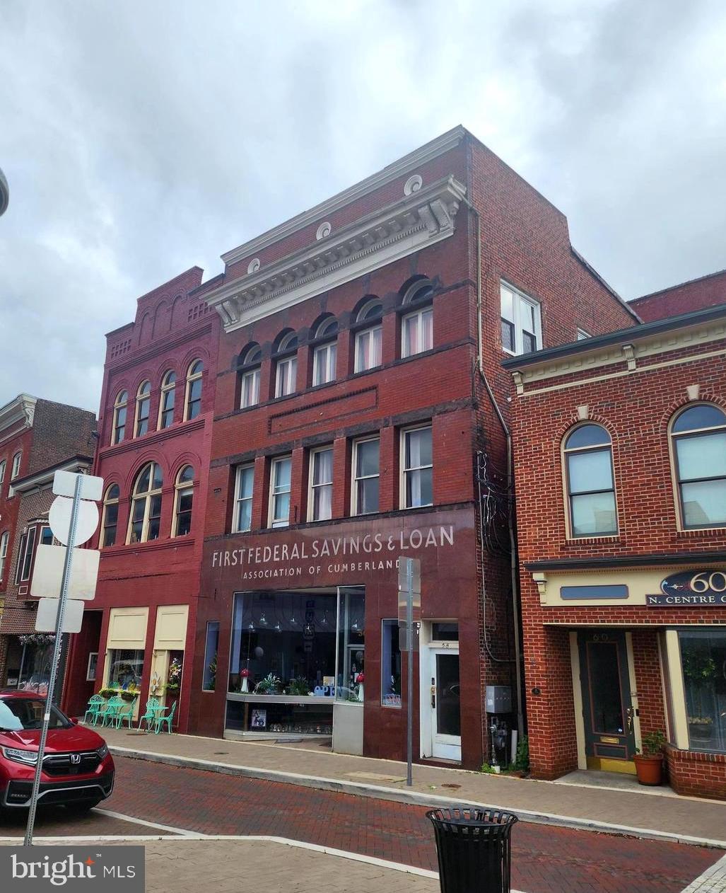 Own a part of the charming up and coming "Reimagine Historic Downtown Cumberland", an opportunity to own a retail ready building with 2nd and 3rd floor office and residential spaces, nestled in a mixed retail and dining streetscape, welcomes guest all day and night life the same, boasts of 4,539 sq ft, expensive updates and renovations in 2016, comes with plently of flexibility, get in while the area is beginning its revival. Don't miss this opportunity