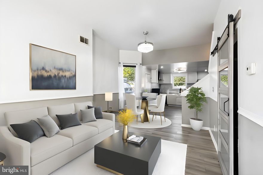 Welcome to 1936 N 23rd Street, where this inviting 4-bedroom, 2-full-bath home is eagerly awaiting its new owner. Conveniently situated on a tranquil street, this beautiful semi-detached red brick residence spans three stories, offering ample space on every level. Upon stepping inside, you're immediately greeted by an open-concept main floor with the added comfort of Central A/C. This space boasts high ceilings, elegant crown moldings, vinyl plank flooring, recessed lighting, and an abundance of natural light streaming in through the generously proportioned windows. The home has undergone a modern transformation, featuring a well-appointed kitchen with pristine white shaker cabinets, sleek granite countertops, and top-of-the-line stainless steel appliances, complete with a stainless steel range hood. Transitioning through the back door of the kitchen, you'll discover a sprawling concrete-paved backyard, an ideal setting for outdoor gatherings with family and friends. Ascending to the second floor, you'll find two thoughtfully sized bedrooms, each offering ample closet space, alongside a generously proportioned primary bathroom. Last but not least, the secluded third floor houses another full bathroom and two generously sized bedrooms, each thoughtfully equipped with closets. While the basement remains unfinished, its vast space holds endless potential for customization, catering to your specific preferences and storage requirements. With over 2,000 square feet of living space, this remarkable property should not be overlooked. It offers proximity to shops, schools, public transportation, and major highways, making it an ideal place to call home.