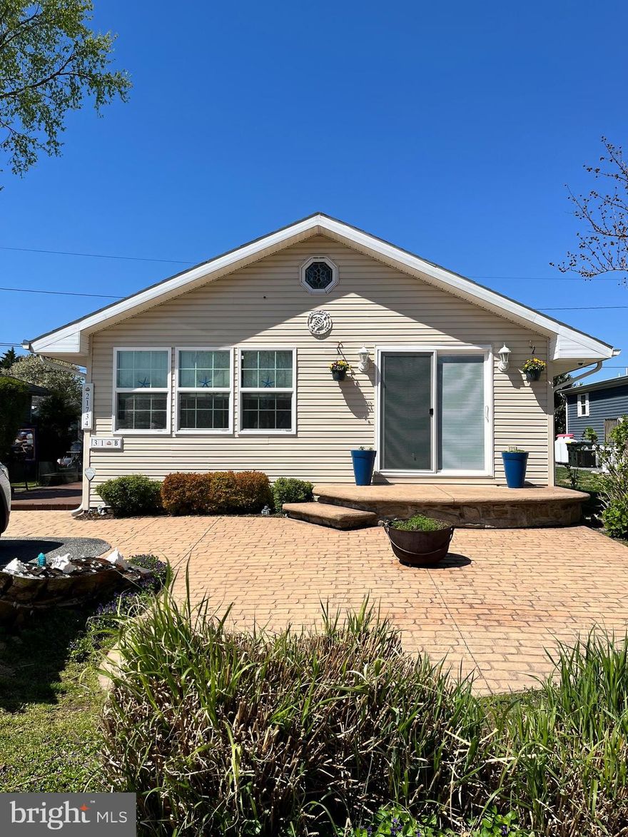 Presenting a fun, beachy home in the desirable, pristine Rehoboth Bay MHP community. This property is ideal for buyers seeking affordable beach living with high-quality finishes and zero maintenance headaches. The flowing floor plan includes three large bedrooms and two full bathrooms, one being in the primary, offering plenty of space for family and guests. Heated floors in the primary bath and whirlpool tubs in both baths. The step down family room provides a comfortable feel. Kayak included, as well. The community provides excellent lifestyle appeal with amenities like playgrounds, community pool and private bay beach. Sports enthusiasts will enjoy the pickleball and tennis courts. Boaters, your paradise awaits: utilize the convenient on-site marina and private boat ramp for seamless access to the water. Whether you're looking for a vacation home or a permanent move to the Delaware coast, this home is move-in ready and waiting for you. Schedule your private tour today!