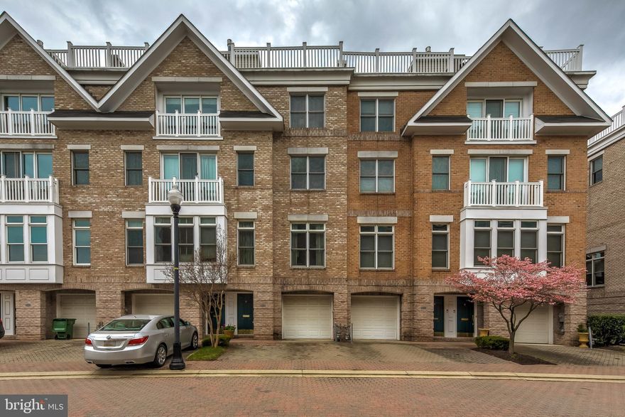 Bright, airy and neutral, this Harborview Community townhome has been freshly painted and is simply glowing with natural light! Offering important improvements such as a newer roof, both HVAC systems and recently refinished gorgeous hardwood floors throughout, this home is ready for you to move right in. Multiple options for Work/Study at home spaces, plus a fabulously open Main Living Level (Kitchen/Dining/Living areas) plus a spacious Family Room with full Wet Bar!  The low maintenance Duradek rooftop terrace offers panoramic urban views and is also the PERFECT place to view the City's splendid firework displays! Harborview offers 17 acres of beautifully landscaped walking/jogging paths, canals promenade, marina, fountains & koi pond. community pool, waterfront fitness center and 24/7 security. HOA benefits include landscaping, snow removal and includes the water bill. Located nearby are great local restaurants and destinations including, Di Pasquale's Market, Order & Chaos Coffee, Little Havana, and Limoncello. Get close to the water in time for summer!