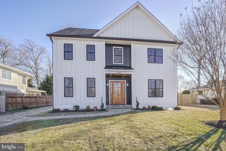 Another Custom, Quality Built Home by Citescape Construction.  Modern Transitional New Construction with 3 Levels of High-end Features!  Welcoming 8' Mahogany Door with 6 Panes of Glass and Side Windows.  10' Ceilings and 9" Wide Plank White Oak Flooring on the Main Level.  Open Concept Gourmet Kitchen with Waterfall Edge Calacatta Luccia Quartz Counters, 42" Warm Maple Shaker Cabinets with Oversized 9" Crown Molding & Soft Close Drawers/Doors, LED Under Cabinet Task Lighting, LED Toe Kick Lighting, Undulating White Subway Tile Back Splash, Huge 8' X 5.5' Center Island with Breakfast Bar & Pendant Lighting, Deep Sink, High-End Kitchen-Aid Stainless Steel Appliances including a 6 Burner Gas Oven, Convection Wall Oven, Built-in Convection Microwave Oven, Refrigerator & Range Hood.  Walk-in Pantry.  Polished Chrome Door/Drawer Pulls, Door Handles & Faucets Throughout.  The Family Room has an Acupanel Feature Wall & Gas Fireplace with Large Format Porcelain Tile Surround. 8' Mahogany Double Doors (6 Panes of Glass in Each Door) open to the Large Brick Paver Patio & Newly Fenced Backyard.  The Dining Room entrance is Accented by Custom Hand-Hewn White Oak Beams.  Modern 7 Light Chandelier.  Lots of Sunlight!   The Office has 8' Glass French Doors, a Custom Accent Panel Wall & Windows on Two Sides.  The Main Level Powder Room has a Rich Maple Wood Vanity with Calacatta Luccia Quartz Counter.  The convenient Driveway Side Door is an 8' Mahogany Door with 6 Panes of Glass that opens to a Mudroom with Custom Built-ins.  LED Recessed Lighting Throughout.  Large Main-Level Storage Closet.  The Staircase has Wood Treads all the way up & Large Windows on each Landing that Provide Sunlight in the Stairway & Hall. The Stairs have a Custom Railing with Contemporary Metal Spindles & Oak Hand Rail. 9' Ceilings on the 2nd Level. 9" Wide Plank White Oak Flooring on the Upper 2 Levels.  Double Door Entrance to the Primary Suite & there are 2 Walk-in Closets.  Ceiling Fan Pre-wire in each Bedroom. The Primary Bathroom has a Huge Glass Enclosed Walk-in Shower with 2 Shower Heads (1 Oversized  Rain Shower Head), Large Scale Porcelain Tile Floor & Shower Surround with Storage Niches, Marble Tile Shower Floor, Accent Tile surrounds the Freestanding Soaking Tub located in the Bathroom Bump Out, Warm Maple Wood Vanity with Calacatta Luccia Quartz Counters, Storage Cabinet & Water Closet. 1 of the 3 additional bedrooms on the same level has an Ensuite Bathroom with Glass Enclosed Walk-in Shower with Hexagonal Porcelain Tile Shower Floor & Large-Scale Porcelain Tile Floor & Shower Surround. There is a Walk-in Closet in that Bedroom as well.  Solid Wood Doors on all of the Bedrooms.  The Hall Bathroom has a Combination Tub/Shower, Dual Sink White Vanity with Calacatta Luccia Quartz Counter, and Porcelain Tile Floor.  Linen Closet.  The Laundry Room on the 2nd Level includes White 42" Shaker Cabinets & Folding Area with Calacatta Luccia Quartz Counter, Laundry Sink, & Porcelain Tile Floor. The Top Level boasts a Large Loft Space with Electric Fireplace, Full Bathroom with Pedestal Sink, Glass Enclosed Walk-in Shower and Diamond Pattern Tile Shower Floor & 5th Bedroom with Windows on 2 Sides & Dormer Bump Out. CAT6 on all 3 levels. 6" Baseboards.  Dual Zone Carrier HVAC System. 75 Gallon Hot Water Heater.  New Sod.  Flat Back Yard with New Fence & Mature Fig Tree.  Flood Lights on Back & Driveway Side.  Keypad entry on the Front Door. Covered Front Entrance with Pine Accent Ceiling.  Brick Paver Driveway with Room for 5+ Cars.  Freshly Painted Storage Shed.  New Landscaping & Mature Crepe Myrtle Tree.   4 Pane Black Double Hung Windows.  Hardie Board & Batten and Hardie Plank Siding. 30 Year Architectural Roof Shingles.  Stroll a Couple of Blocks to Hollin Hall Village's Restaurants & Retail which includes a Grocery Store & Hardware Store.  About 3 Blocks to Mount Vernon Park pool, tennis courts & more.  Located in the Highly Rated Waynewood School District.