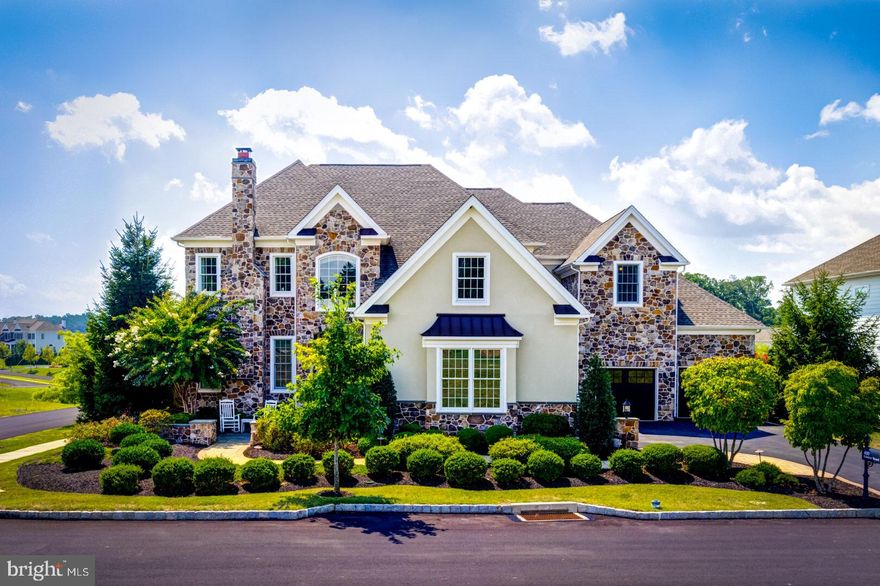 Unbelievable opportunity to purchase this exquisite former Model Home in the sought after community of Liseter in Newtown Square.  Loaded with upgrades this fabulous custom Magnolia Heritage floor plan offers over 6177  square feet of exceptional living space and is perfectly situated on a private corner lot over looking the Pavillion Park and open space. 4 Bedrooms. 4 1/2 Baths  which is easily expandable to five with upstairs family area. Dramatic Two story Center Hall and Living Room with beautiful built ins , beautiful tile and hardwood flooring,large formal Dining Room with wall of custom cabinetry with quartz countertops and dual wine coolers make entertaining easy. Magnificent Family Room with 20 foot coffered ceilings, an expanded two story bow window totally lighting up the room and great space for a grand piano opens to Gourmet Kitchen with upgraded white cabinetry and large 8 foot island with Zodiaq Coriander Quartz countertops, ceramic and glass dimensional tile backsplash , top of the line stainless steel Appliances adjacent  to spacious Breakfast area with access to the the double tiered deck and rear patio with outdoor fireplace and built in barbecue. Private first floor study with beautiful builtins and Formal powder Room with pedestal sick and stone accent wall. Luxurious 1st floor master suite features 10 foot tray ceiling and ample sitting area and leads to spa style en-suite Master Bath  with elegant free standing tub and oversized double marble shower with seamless glass doors running the length of the room and spacious walk in master closet with customized built ins.  An expanded Mud room/ Laundry room with entrance to one of  2 two car garages completes this level.  The second floor features 9 foot ceilings, a very special princess suite with its own private bath, a large upstairs family room/ loft which could be easily converted to a 5 th bedroom and third and fourth bedrooms that share an adjoining bath.  The finished lower level is just stunning and offers a spectacular Great Room with Large custom wet bar with seating for six, large sitting area, a dining area, a state of the art walk-in glass walled wine cellar, and two game areas and double french doors open to a walk up pathway to the the rear multi tier deck and paver patio areas. The Lower level also has a media area, exercise area and another game area and a full bath. There is also a large storage are with built in shelves.  
The back yard has been thoughtfully landscaped and features a freestanding stone fireplace with sitting area and pergola on cobblestone patio, dining area and a built granite and stone island with built in barbecue surrounded by multi tier deck perfect for outdoor entertaining. This special home has it all and you can also enjoy the Liseter lifestyle that offers the Carriage Barn  for events and Liseter gatherings a Clubhouse and full gym , infinity pool overlooking exceptional open space and grounds, Basketball and Tennis courts and wonderful mikes of walking trails.  Move right into to this Better than New Home in this convenient location within minutes to downtown Wayne, Newtown Square, the train to Center City and an easy commute to center City and the airport.