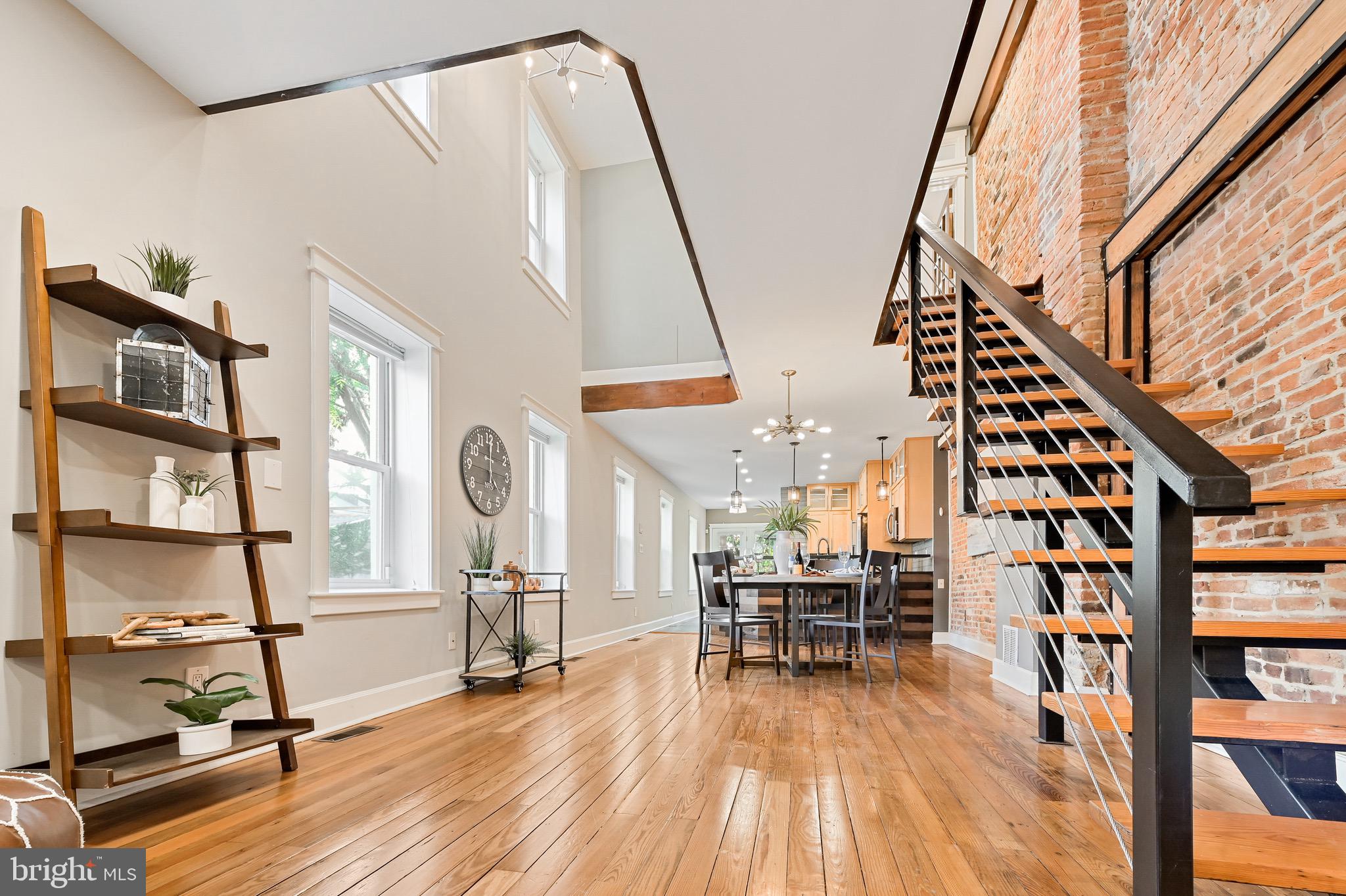18 S. Wolfe Street is a one-of-a-kind masterpiece. Strategic architecture, so that the natural wood tones are perfectly lit by the light that pours in through the two story ceiling windows. This 4 bedroom/4 full bathroom/1 half bathroom Modern Industrial home has wood, metal, stone and glass purposefully placed to bring an ambience that you have never experienced before. The basement apartment has a private entrance and can be used as passive income generating up to $1,300.00. The two tier roof deck offers sweeping views of Baltimore City. There are three quarter inch Brazilian Hard Woods through out, Designer Sinks, Dual Fueled Oven, Custom Tile Work in all bathrooms and much more.