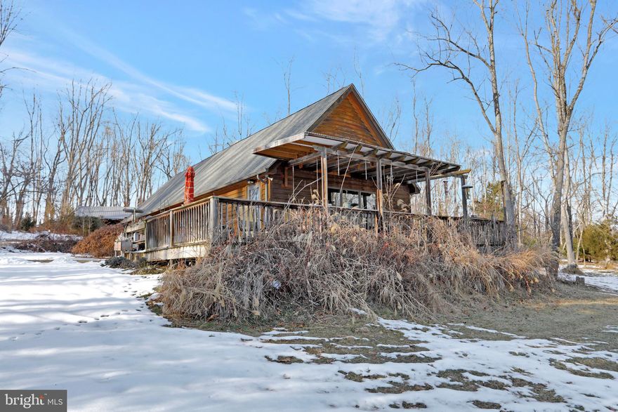 WOW! Looking for Mountain Views then look no further. This one owner Cabin has just that.  Nestled in the heart of the Shenandoah Valley this property offer 3.67 hilltop acres, around 1400sqft of living space, vaulted ceilings in the Great Room, radiant heat, wrap around deck, pole barn, generator, and so much more. This home would make a great permanent residence or vacation home. Call today to schedule your appointment. This property won't last long.