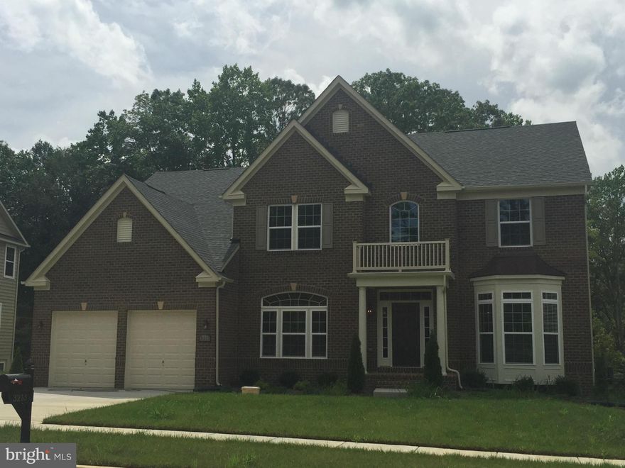 PRICE IMPROVEMENT!! Stunning Courtland Gate Model on beautiful wooded home site with deck, gourmet  kitchen and morning room, double ovens, upgrade kitchen cabinetry,  granite countertops luxury owners suite with sitting room, 4 full baths, hardwood floors fireplace, and finished rec room.  Now offering 20,000 toward closing assistance w/ the use of NVRM. Images shown are representative only.