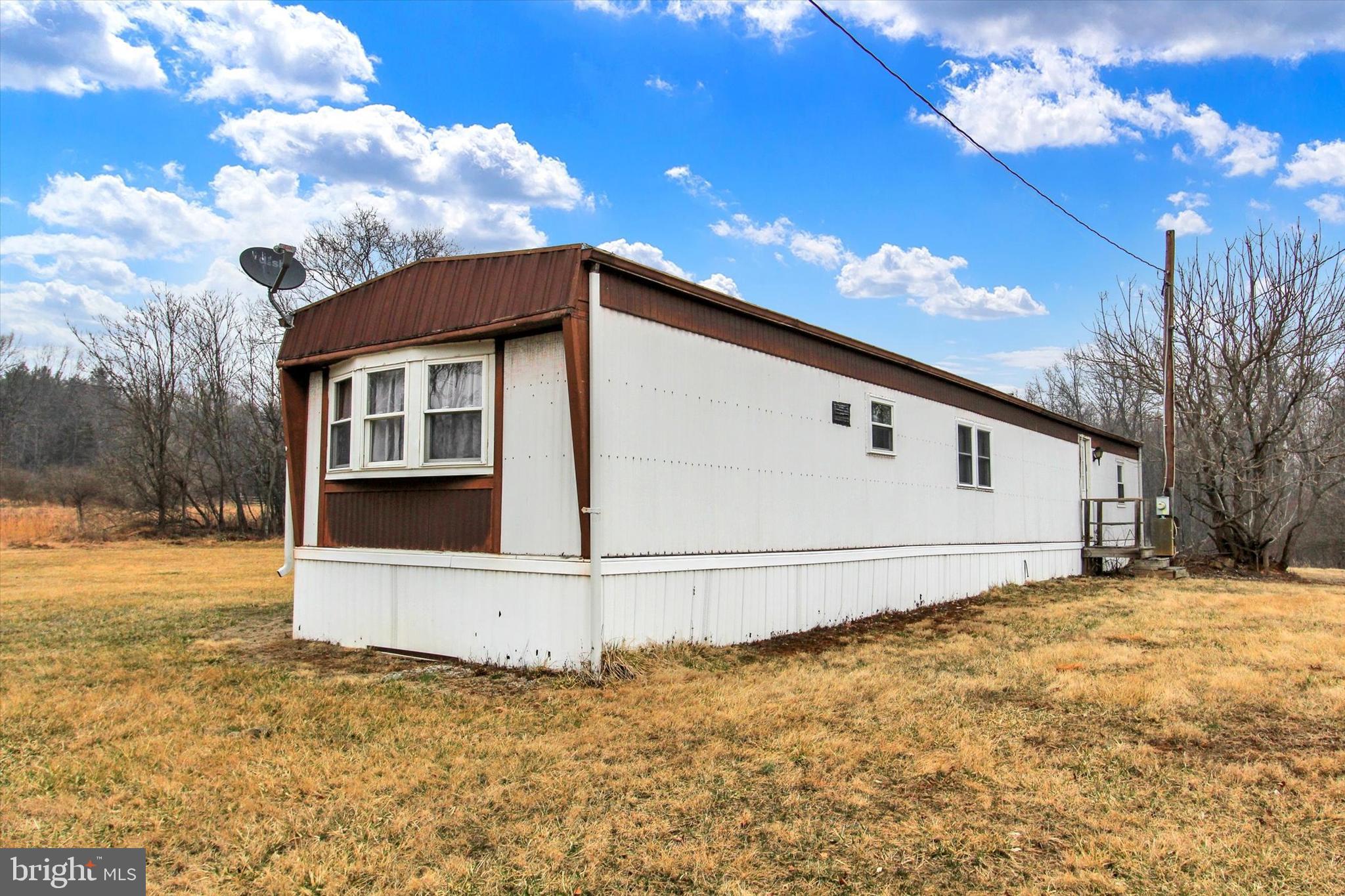 HIGHLAND TOWNSHIP - Commercial Sale
