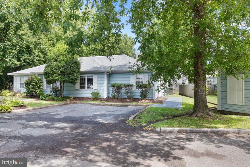 ** All offers must be submitted by 4pm 8/19**2 bedrooms | 2 full baths | 2 front shady spaces
A spacious 1,176 ranch style condo set on a tree-lined street in West Ocean City offers plenty of natural light, easy to maintain laminate flooring, and an open concept.  Stunning home features a living room with floor to ceiling built-ins, a central kitchen, and an open dining room with glass sliders stepping to a screened porch and backyard.  The cook’s delight kitchen boasts a curved work with a breakfast bar, recessed lighting, crisp white cabinetry, ample counter and prep space, and white appliances.  Owner’s suite is on one side with a private bath and the second bedroom and bath are on the other affording privacy to all.  Close to marinas, shopping, beaches, Assateague Island, and more!