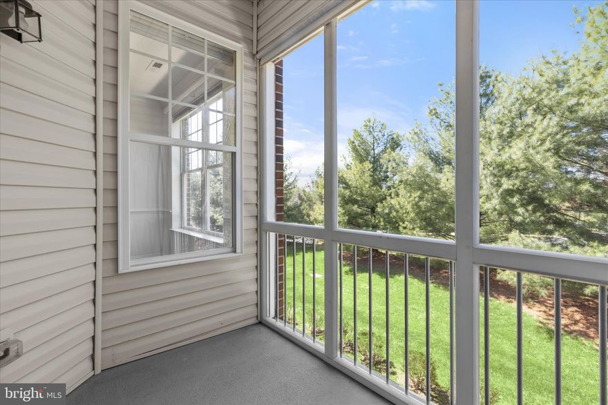 Welcome to easy living in this well-maintained 55+ community. This 2-bedroom, 2-bath condo with secured entry offers a spacious, light-filled layout designed for comfort and convenience. The hardwood foyer opens to a generous living and dining area accented by chair railing, crown molding, plush carpeting and a soft neutral color palette. Step outside to the private balcony, where mature trees create a colorful backdrop and a relaxing place to enjoy nature.
Back inside, the spacious eat-in kitchen features rich hardwood flooring, coordinating appliances, a center island, and a cozy breakfast nook. Just beyond the breakfast nook is a bright and versatile bonus room that can easily serve as a home office, sitting area, or additional dining space. Down the hall, the primary bedroom suite offers soft carpeting, a walk-in closet, and a private en suite bath. For added privacy, the second bedroom and second full bath are located on the opposite side of the unit. A separate laundry room includes a full-size washer and dryer.
This 1,310 square foot condo also stands out for its recent updates, including a newer HVAC system (2021), dishwasher (2022), paint and carpet (2023), new gas range (2025), and recently cleaned dryer vent. Gas heat adds to the home's overall comfort and efficiency. Conveniently located across from the Abingdon Library and close to shopping, dining, and I-95, this home offers a practical and comfortable lifestyle in a convenient setting.
Notes: Select interior photos have been virtually staged.