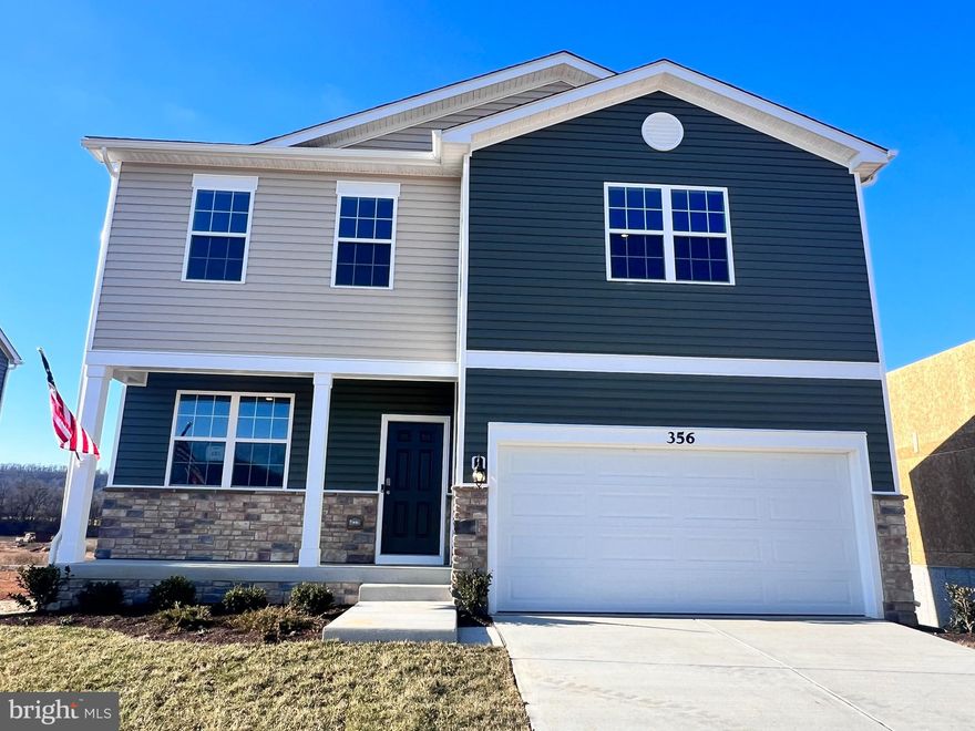 Immediate Delivery! No need to wait! This Eastover features 9 ft ceilings on the main level with a flex room that can be used as a office, dining room or playroom for the kids.The large foyer leads to open concept kitchen, dining and family room which  includes white cabinets, stainless steel appliances, granite and large pantry. Great storage off of the 2nd level laundry room. This home is on a full walk out basment that offers a 6' sliding glass door and 2 30/50 windows for great light and also offers a finished Rec Room and rough in for a future full bath as well as great storage.  All of our homes have a concrete drive way that leads into a oversized 2 car garage and includes a garage door opener!
 Ceiling fan rough-in's in all the bedrooms and family room. Agents ask about our Realtor VIP Program!!