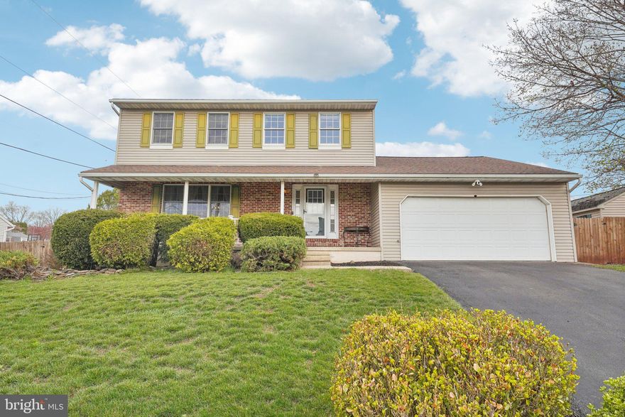 Welcome to this spacious and move-in ready single-family home in the desirable Amity Garden neighborhood! Enter through the inviting covered front porch and into a bright foyer with ceramic tile flooring. The living room features large front windows and laminate wood floors, a perfect place for relaxing or entertaining. The formal dining room boasts a large window and the same laminate wood floors, creating a visual flow throughout these main living areas. The kitchen has ceramic tile flooring, generous cabinet and counter space, a convenient pantry, and newer LG stainless steel appliances. Its open-concept design seamlessly flows to the adjacent family room, with space for a breakfast table in between. The family room is warm and inviting, featuring a huge skylight that bathes the space in natural light, along with a brick surround pellet stove, creating the perfect ambiance for cozy nights at home. French doors with built-in shades lead to a large sunroom, offering even more space to relax and entertain. From the sunroom, you can access the outdoors through sliders on either side to your very own backyard oasis. One side opens to a large, low-maintenance composite deck with a charming gazebo—perfect for outdoor gatherings. The other side leads to one of the sheds, providing plenty of storage. The fully fenced backyard (with a new fence installed in 2020) is flat and private, featuring another shed in the rear, ensuring you have everything you need for both work and play. A convenient half bath completes the main level. Upstairs, you’ll find four spacious bedrooms, including the primary suite. The primary bedroom features laminate wood floors and a private ensuite bathroom with a brand-new walk-in shower installed in 2024. The three secondary bedrooms share a full hall bath, ensuring ample space for family or guests. The fully finished basement adds even more living space, with a large rec room featuring built-ins and another pellet stove. The laundry room is spacious and includes a built-in counter for folding or office work that overlooks the rec room, making multitasking a breeze. Additional updates to this home include a new hot water heater in 2022, new roof shingles in 2014, and a new water softener in 2021, offering peace of mind for years to come. Located just minutes from Lake Drive Park and with easy access to Route 422, this home is perfectly situated for both convenience and tranquility.