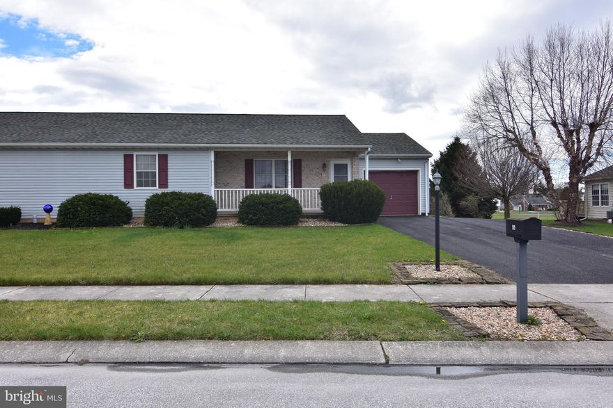 Nice one level home with 2 full baths.  One car garage, covered patio,  finished lower level& peninsula in kitchen.  Backs up to park area.