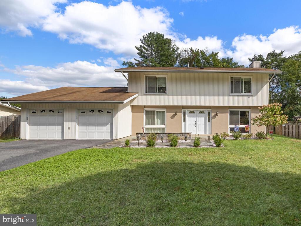 Showings available Saturdays and Sundays 11:30-4:00. Bright and sunny 4 bedroom colonial on quiet, no-through street. Unique custom front patio welcomes you into this immaculately updated home w/the best yard in town, and a front door with a keyless lock system. Views of the amazing landscaping can be enjoyed from every room! Doing dishes will never be a chore w/the garden window over the sink. Perfect for entertaining with two sets of custom sliding glass doors opening to two spacious patios. Recent features include hardwood flooring on the upper level, and larger custom built walk-in closet in the main bedroom. Don't miss the great outdoor space including two patios; large level yard and a fully fenced back yard! Two-car garage with a wall of cabinets for more of your storage needs! This home is wired and ready for an alarm system of your choice! Enjoy summer fun at the Tanterra Community Pool included in your hoa package! This one won't last long!
