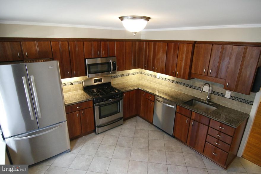 NOW ACCEPTING ALL BACK UP OFFERS  / Walk to historic downtown Falls Church City, Restaurants, Spa's, Bars, Dining, Pools, Recreation Communities, and the West Falls Church Metro on the orange line. The school districts here are some of the best in the country. Come see this beautifully fully remodeled 4 Bedroom 4 Bathroom 3 Level Dutch Colonial Townhome with a walk out basement.