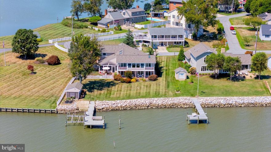 Experience the best of Chesapeake Bay waterfront living in this stunning 4-bedroom, 3-bathroom home, perfectly situated in a picturesque setting. If you've ever dreamed of living in paradise, now is the time to make that dream a reality. This home features an open floor plan that showcases breathtaking Bay views from the main living area, dining room, gourmet kitchen with custom cabinetry and an adjacent butler's pantry, and the spacious master suite complete with balconies.
Relax and entertain on the expansive waterfront screened porch, where you can take in the ever-changing beauty of the Bay—whether it’s watching osprey soar in the summer, tundra swans glide in the winter, or waterfowl grace the waters throughout the year. Set on nearly a third of an acre, the property includes a private pier, a ramp for easy launching of watercraft, a large storage shed, and a partially fenced yard perfect for children or pets. The home also offers a spacious laundry room, an attached garage with ample work areas and storage, as well as additional storage conveniently located on the second floor. This is a must-see property that offers the perfect blend of comfort, style, and unparalleled natural beauty.