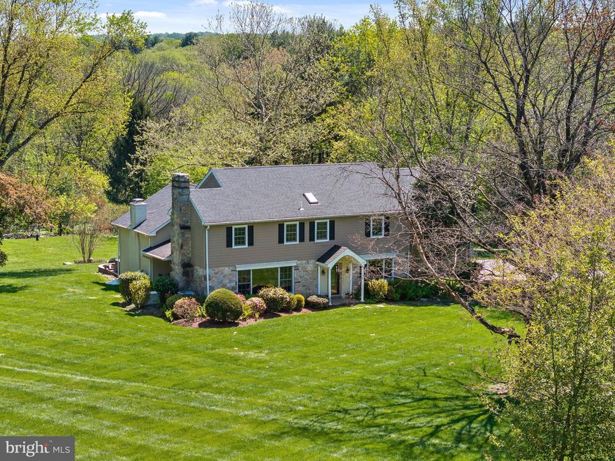 Set on a beautifully level and meticulously maintained  2.4-acre lot in desirable Malvern, this spacious and thoughtfully updated and improved home offers the perfect blend of comfort, functionality, and timeless appeal. With five generously sized bedrooms, three full baths—including one in the finished lower level—and a convenient first-floor powder room, the layout is designed to accommodate both everyday living and effortless entertaining.
The home welcomes you with light-filled interiors and gleaming hardwood floors throughout most of the first and second levels. A thoughtfully designed family room addition (2007) creates a warm and inviting gathering space, with wood burning fireplace, and patio doors to the rear. Theres an office/study area on the first floor with external access too. The convenience of an upstairs laundry room enhances modern living. Significant updates include a newer roof (2021) and all new windows (2011), reflecting the care and attention invested in the property. The property features a formal sitting room with a wood-burning fireplace and a formal dining room, both conveniently located near the kitchen, which was substantially renovated in 2017, making it ideal for family gatherings and dinners.
The fully finished basement (2010) expands the living space considerably, featuring a full bath, kitchen area, spacious recreation room with egress, and additional flexible areas ideal for guests, hobbies, or extended living—along with ample storage and utility space.
Step outside to enjoy the expansive, private grounds and generous patio—perfect for outdoor dining, entertaining, or simply relaxing in a serene setting. Additional highlights include an attached two-car garage, propane generator for essential systems, public water, and on-site septic.
Ideally located in a charming, established neighborhood within a highly regarded school district, this home offers exceptional convenience to major roadways, making commuting to Philadelphia, the airport, and surrounding destinations effortless.
Bright, spacious, and move-in ready—this is a home where comfort meets convenience, and where so many love to call home.