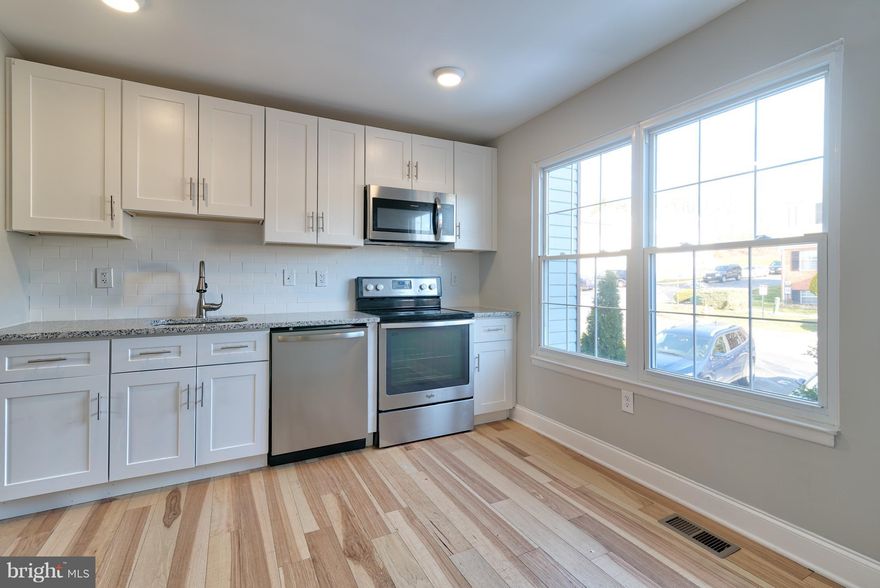 This updated Franklin Ridge Townhouse is move in ready! Features include: spacious living room w/loads of natural light, recessed lighting, hardwood floors, new carpet, granite counter tops, ss appliances, tons of storage and cabinet space, master br with connected full bath/hall bath, finished lower family room and fenced rear yard w/ patio. 1 Parking Space Incl., Conventional financing only!