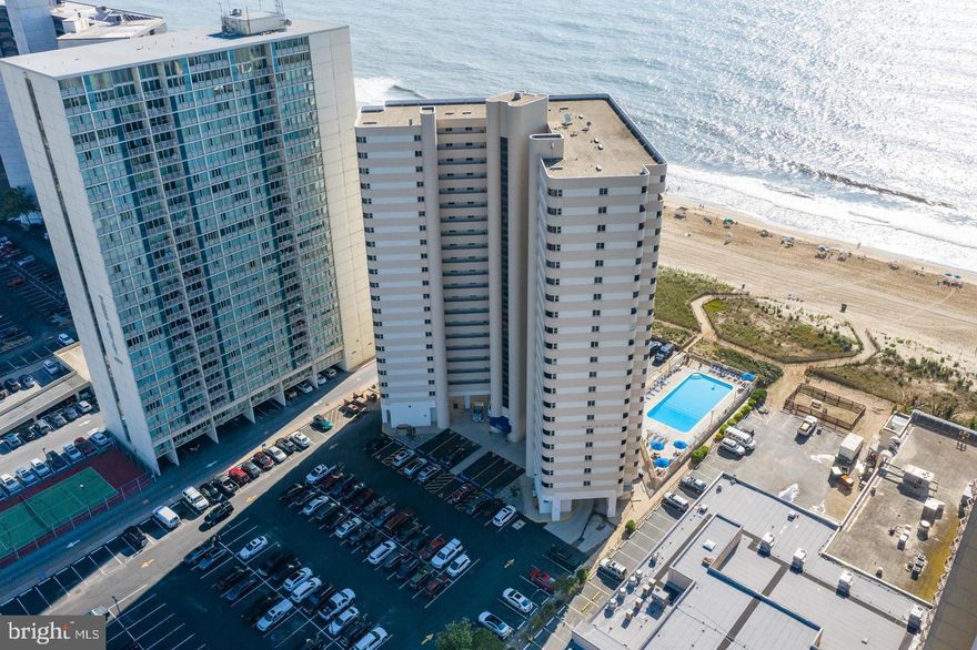 Experience the ultimate beachfront living in this stunning 18th-floor efficiency condo located in the heart of Ocean City, Maryland. This unique property offers a seamless blend of comfort and versatility, with a spacious, multifunctional living area that effortlessly converts from a cozy living room to an inviting dining space and a tranquil bedroom. Enjoy the added luxury of a wraparound, enclosed sunroom, perfect for soaking up panoramic views of the shimmering Atlantic Ocean and serene bay.

Just steps away, the soft sandy beaches beckon for sun-filled days, with a private, gated pool and exclusive dog relief station this condo caters to all your leisure needs. This condo's prime location in a coveted high-rise building ensures peace and privacy, making it an ideal escape or a delightful year-round residence.

With direct beach access through picturesque dunes, this property not only promises a lifestyle of relaxation and recreation but also positions you perfectly to enjoy all that Ocean City has to offer—from bustling summer markets and festivals to quiet winter walks along the shore.

Maximize your investment with the option to rent the unit weekly for additional income. Convenience is key with an in-unit laundry facility and ample parking, enhancing both comfort and functionality.

Don’t miss the opportunity to own this slice of paradise, where every day feels like a vacation!