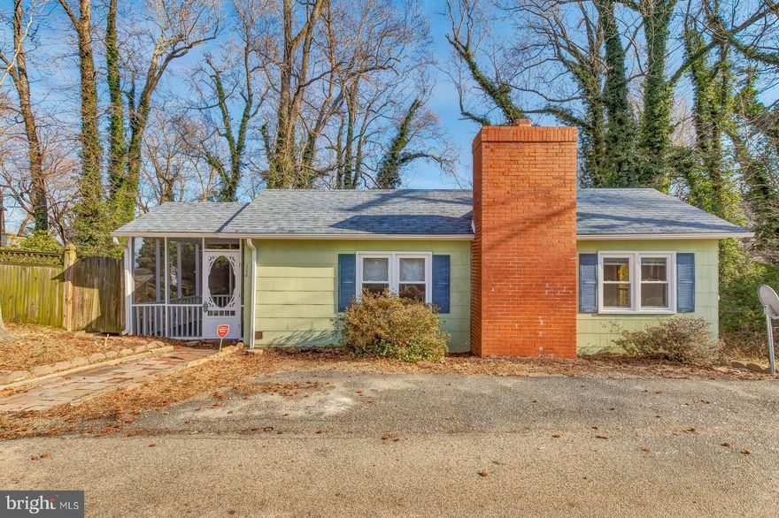 First time home buyers welcomed! This beautiful 3 bedroom 1 bathroom, 1,248 sqft home is located just walking distance to PRIVATE community beach and fishing pier! Original hardwood flooring welcomes you at the door and continues throughout the entire main level. Large main floor living room features a fireplace and two gorgeous stain-glass windows that give off the perfect amount of charm. Entertain guests in your newly updated kitchen or continue outside on your back deck that overlooks your private, fully fenced in backyard. Looking for an investment property? This property offers positive cash flow as a rental!