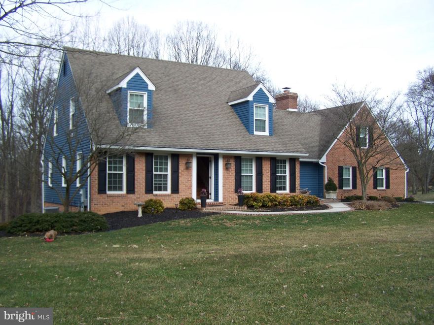 HOME AND GROUNDS ARE REMARKABLE! END OF STREET BACKS TO WOODS/STREAM AND OPEN LAND, VERY PRIVATE IN ESTABLISHED SUBDIVISION. QUALITY THROUGHOUT INSIDE & OUT.  NEW VINYL SIDING & GUTTERS & CHIMNEY POINTED & SEALED. 2018- COMPLETE NEW ENGINEERED DECK  OFF FAMILY ROOM-20X18 COVERED WITH BRAND NEW ROOF & 15X14 AREA OPEN PROVIDES EXCELLENT VIEW OF WOODED PRIVATE REAR YARD AND WOODS, ALSO NEW CONSTANT PRESSURE WELL PUMP INSTALLED. 2017-PREMIUM VINYL PLANK FLOORING IN BASEMENT, UPDATED. 2016-NEW FRONT PATIO & SIDEWALK, FRONT STOOP. 2015-MAIN FLOOR RENOVATION-WOOD FLOORS, BUILTIN SHELVING, BUTLER PANTRY, COFFEE BAR. 2013-NEW MASTER BATH & MASTER CLOSET, UPPER HALL BATH, REPLACEMENT WINDOWS. 2012-NEW POWDER ROOM MAIN LEVEL. 2005- FINISHED BASEMENT. KITCHEN HAS CENTER ISLAND WITH GAS DOWNDRAFT GRILLE/STOVE  AND CONTRASTING GRANITE COUNTERS. DOUBLE WALL OVENS COMBO/ CONVECTION,  42" CABINETS & CORIAN COUNTER. KITCHEN OPENS TO LARGE FAMILY ROOM W/FIREPLACE WITH SLIDER TO BRAND NEW COVERED DECK. FORMAL DINING ROOM, LIVING, & PRIVATE OFFICE OFF FOYER. ENCLOSED FRONT AREA WAY TO GARAGE. GARAGE HAS WALK UP FLOORED ATTIC FOR STORAGE.  WALK IN MASTER BEDROOM CLOSET IS VERY LARGE AND CUSTOM DESIGNED FOR EXTRA STORAGE.  THERE IS NO WAY TO DESCRIBE EVERYTHING,  QUALITY THROUGHOUT AND MOVE IN CONDITION. YOU WILL LOVE IT.