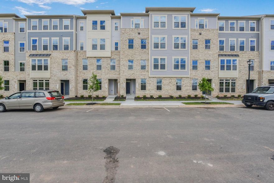 **Immediately available to occupy**Brand New 3BR/2.5BA Townhome/Condo in Arcola Town Center. Be the first to live in this stunning, never-before-occupied two-level townhome/condo. This ground-level entry home offers: 3 spacious bedrooms, including a primary suite with private bath, 2.5 modern bathrooms, 1-car garage plus ample guest parking in front of the building. Beautiful LVP flooring on the main level. Gourmet kitchen with stainless steel appliances and sleek quartz countertops. Upstairs laundry room for added convenience. Enjoy the luxury of low-maintenance living with fantastic community amenities, including a clubhouse and pool. Just steps from the newly opened Elaine E. Thompson Elementary School and minutes away from Aldi and Dulles Landing Shopping Center, featuring Walmart, Dick’s Sporting Goods, HomeGoods, and more. Pets and smoking  are not allowed. Don’t miss this opportunity to live in a brand-new home.