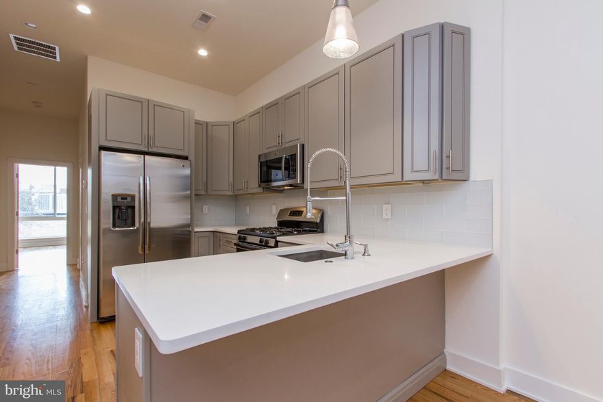 Ready to enjoy the nightlife in Northern Liberties? Kick it in Olde Kensington? Have fun in Fishtown? Welcome to 976 N Marshall #3, a condo that allows you to do  all of the above; maximize city living while living in contemporary and comfortable quarters. This 3 BD/3 BA condo comes equipped with hardwood floors, an eat-in kitchen with quartz countertops and a cozy peninsula, high-end fixtures, and spacious bathrooms (one of which has a glass shower to boot)! Each bedroom is appropriately sized and paired with ample closet space for your professional or city chic wardrobes. The private roof deck is perfect for al fresco dining and entertaining with the panoramic  skyline views! Take advantage of nearby restaurants - Heritage, Cantina, Cadence, Cafe La Maude, and One Shot Cafe - when you're craving a meal that is within walking distance of home. Easy access to I-95, I-76, and major highways. Nearby public transit for commute to/from the city. $50 per month per dog, $35 per cat per month. Other pets vary case by case. Landlord pays HOA (snow removal, trash removal, exterior maintenance, etc.). Tenant responsible for all utilities. $40 application fee. Generally, first, last, security required upon move-in. Available March 15th. 12+ month leases preferred.