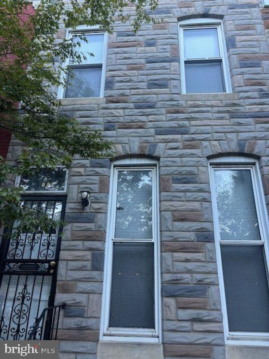 Step into a world of elegance and comfort in this beautifully renovated 3-bedroom, 1-bathroom townhouse, a perfect blend of traditional charm and modern luxury. Built in 1920 and set to shine with a major renovation in 2024, this residence offers a unique opportunity to experience upscale living in a historic setting. As you enter, you are greeted by a stunning curved staircase that sets the tone for the rest of the home. The traditional floor plan flows seamlessly, featuring a spacious dining area and a cozy breakfast nook, ideal for intimate gatherings or leisurely mornings. The living spaces are adorned with plush carpeting and elegant recessed lighting, creating a warm and inviting atmosphere throughout. The heart of the home is the well-appointed kitchen, equipped with high-end appliances including an ENERGY STAR refrigerator, a built-in microwave, and a gas oven/range. Whether you are a culinary enthusiast or simply enjoy the convenience of modern amenities, this kitchen is designed to inspire. Natural light floods the home, thanks to thoughtfully placed skylights that enhance the airy feel of the interior. The primary bath offers a serene retreat, combining functionality with style, ensuring your daily routines are both comfortable and luxurious. This property is not just a home; it's a lifestyle. With an availability date of September 22, 2025, you have the opportunity to secure this exquisite residence for a minimum lease of 12 months. Enjoy the peace of mind that comes with energy-efficient appliances and a well-maintained environment, all while being part of a vibrant community. Located less than a mile from public transportation, this townhouse provides easy access to the city while maintaining a sense of tranquility. The unfinished basement offers additional storage or the potential for customization, allowing you to tailor the space to your needs. Experience the perfect blend of historic charm and modern luxury in this exceptional townhouse. Schedule your private tour today and discover the exclusive lifestyle that awaits you in this remarkable property.