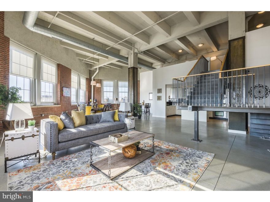 STUNNING CUSTOM PENTHOUSE. Enjoy space, comfort and luxury in this one-of-a-kind, 3600+ sq ft oversized penthouse unit at the Lofts at Bella Vista. A large private roof deck is perfect for entertaining, and completes this spectacular home. This home at the Lofts at Bella Vista comes with many amenities including 2 large GARAGE PARKING spots (which both can accommodate lifts for a total of FOUR parking spots), an oversized STORAGE UNIT, 24 hour concierge, state-of the-art fitness center, bicycle storage, and a resident's lounge. Perfectly situated in Bella Vista, this pet-friendly home is minutes away from fine dining, one-of-a kind shopping and exciting nightlife. Washington Square West, the Italian Market, Passyunk Square and major transportation centers are just around the corner.