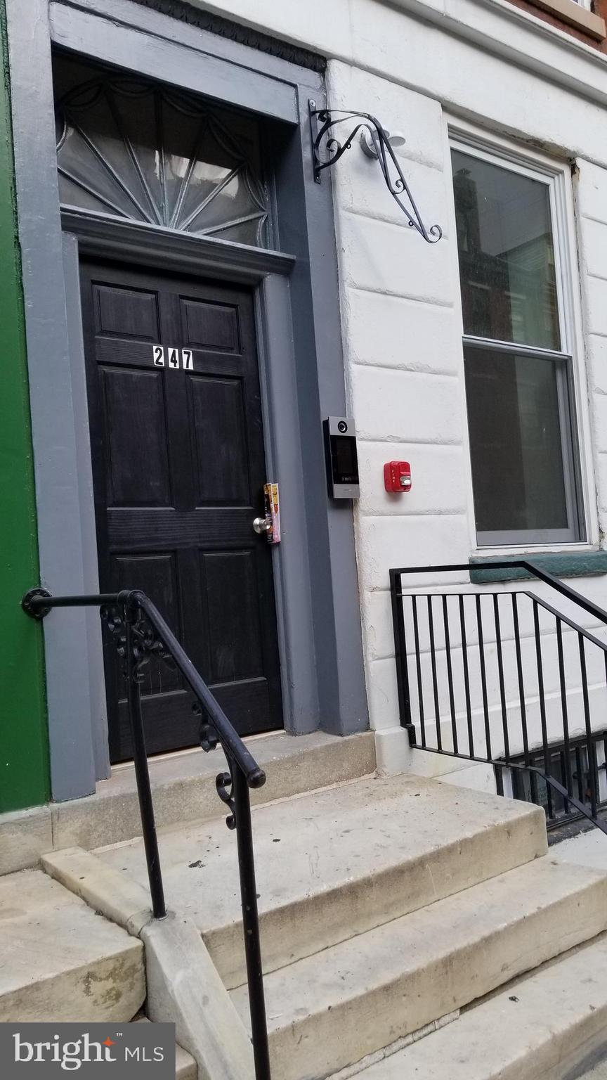 Very Large studio apartment with high ceilings, wood floors and three tall windows facing west. Bar counter top kitchen with all stainless appliances. Large bath with a full tub and a separate laundry closet with washer & dryer.