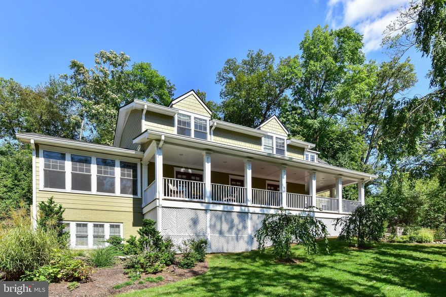 Nestled amongst the trees this is an in town retreat!Fabulous 5 bedroom, 4.5 bath OPEN concept Craftsman with over 4,700 sq ft of living space a serene setting tucked away on a 13,700  sq foot lot.Total renovation and expansion in 2014 boasting open floor plan with abundant windows, wide plank wood floors, exceptional craftsmanship and finishes throughout.  Gourmet chefs kitchen with Carerra marble center island. Spacious family room with cathedral ceilings, gas fireplace and floor to ceiling windows.Three bedroom suites the upper level with walk in closets including an incredible owners suite.Lower level recreation room with custom builtin wet bar, cabinets and marble counters,2 bedrooms, bonus/mud room and full bath.Wide wrap around porch, rear deck, irrigation and over 150K added in landscape, hardscape, trees and professional lighting!Maury Elementary school. Convenient to 2 metro stops, shops and restaurants in Old Town and Del Ray!