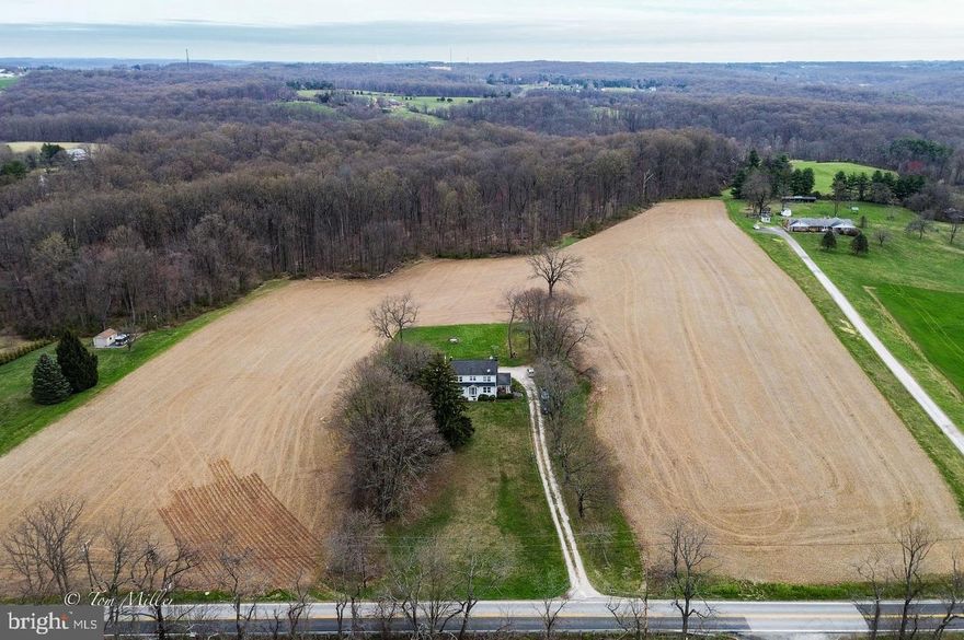 Welcome to Mayfield, an 18 acre Monkton estate situated in the heart of My Lady’s Manor. This classic property features a 4 bedroom center hall colonial that has been completely reimagined, renovated and restored plus an additional building right for a future home. Ideal for a family compound. A few minutes from St. James Academy, the Manor Tavern and Inverness Brewery. A short drive to the conveniences of Jacksonville Four Corners and Historic Monkton Station and the Monkton hike and bike trail. Your own private sanctuary with vistas evoking images of the great Maryland fox hunt. There's plenty of room for a swimming pool and tennis court. Also ideally suited for a stable and paddocks of your own design, whether you follow Horse and Hound or prefer dressage and show, it’s all within your reach! The opportunities are endless!

The 4 bedroom 2 ½ bathroom house, situated at the perfect elevation on 18 magnificent rolling acres, consists of pastures abutting mature woodlands with trails. A traditional floorplan meets modern amenities and features. With exceptional attention to detail and high-end finishes throughout, there is nothing more to do but move right in! A luxurious open-concept gourmet kitchen flows effortlessly into a sun filled family room. The stately foyer shows off the craftmanship and charm of a bygone era. A large and airy living room with fireplace and adjacent veranda ideal for entertaining and outdoor living. A fully finished lower level includes a full bath and is a great flex space for whatever your needs may be. A one-of-a-kind location with postcard pastoral views of rolling meadows, surrounded by family estates, horse farms and land in conservation.

New electrical, HVAC, septic, plumbing, windows, roof, siding, kitchen, bathrooms, high end appliances and fixtures, while maintaining all original period detail.

Hereford Zone Blue Ribbon schools. A perfect blend of classic charm and modern luxury, this magnificent property awaits you!
