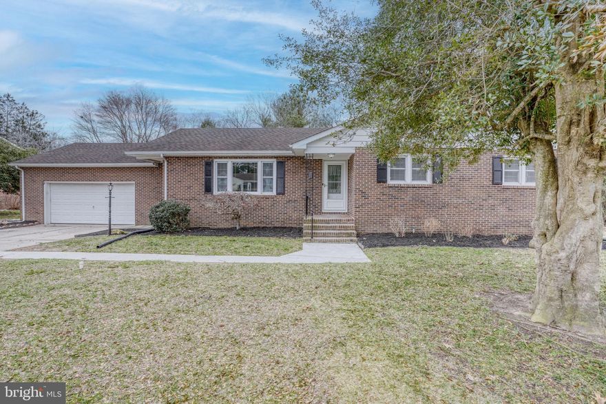 Welcome Home to This Charming Brick-Front Beauty in Milford!

Nestled just outside Milford city limits, this inviting home offers the best of both worlds — peaceful living with no HOA fees and no city taxes. Ideally located near Route 113 and Route 1, you’ll enjoy quick and easy access to both the Delaware and Maryland beaches while still being close to town conveniences

Step inside to find spacious rooms throughout — every bedroom offers generous square footage, with no small rooms in sight. The primary suite features a unique double-room layout, perfect for creating a private sitting area, dressing space, or office while your partner rests undisturbed.

The living room opens seamlessly to the updated kitchen and dining area, creating an ideal flow for everyday living and entertaining. You’ll love the brand-new LVP flooring, granite countertops, and the warm, welcoming feel that ties the spaces together.

The family room is filled with natural light and provides the perfect setting for playtime, relaxation, or hosting gatherings.

Downstairs, the full basement spans the entire footprint of the home and is divided into two expansive sections. The unfinished area is perfect for a home gym, workshop, or storage, while the finished area features a built-in bar — an entertainer’s dream!

With so much to offer — from its thoughtful layout to its unbeatable location — this home is truly one of a kind. Don’t miss your chance to make it yours!