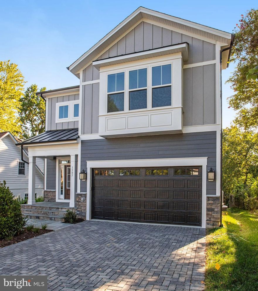 **Amazing location, short 10 minute walk to the East Falls Church Metro, Finished Model Home and READY NOW!  4,199 finished sq feet. Quiet Street close to Benjamin Banneker and other parks, playgrounds, sports fields, Dog Park and miles of paths just steps away.  This property is also walking close to fun in City of Falls Church.
Once inside this 5BR, 4.5BA home you will find custom windows reaching to the second level.  This home has wide plank hardwood floors throughout the main level, upper hallway and owners bedroom. The Main Level sports 10 Foot Ceilings, Family Room with modern Cosmos Fireplace and detailed coffer ceiling, formal Dining Room, Office/Study and Morning Room off Kitchen.  The Kitchen has Stacked Kitchen Cabinets with glass doors and lights, and GE Café Appliances.  A Modern metal stair rails guides you up to the second floor with 4BR and 3.5BAs and Laundry.  The Owners Suite comes with Soaking Tub, separate Shower with Rain Shower and Handheld diverter Heads, and large walk-in closet.  The Basement has a Finished Rec-Room with Wet Bar, full BR and BA, and Media Room.  Other features include a whole house fan on the second level with ability to improve the air quality within the entire home, 2x6 Framing, a “best in the business” 10 year transferable warranty, pest tubes in walls, and other standard quality features.