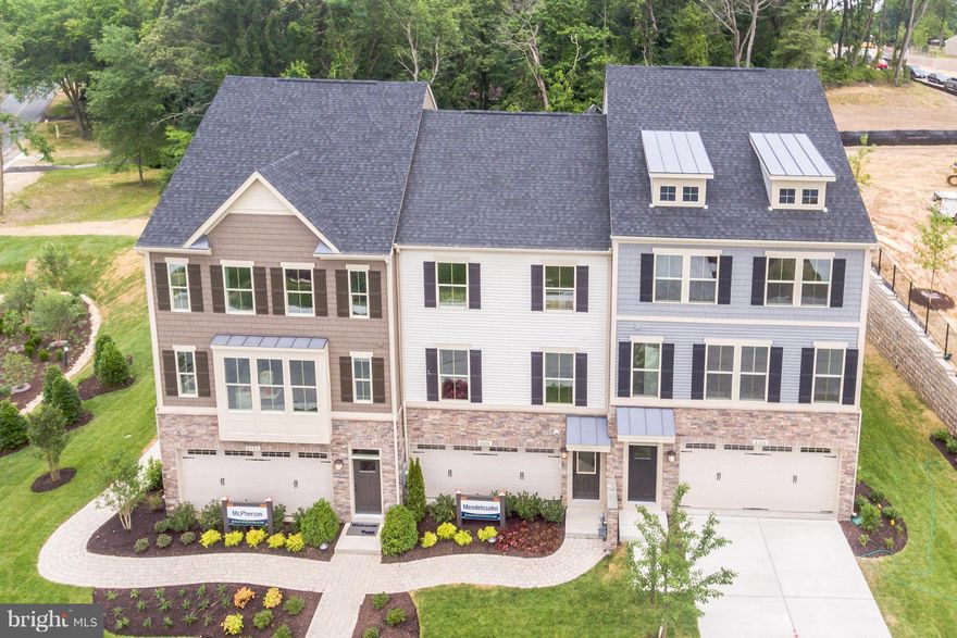 Last January move-in w/ unbeatable value for 2 Car Garage TH at Pondview in desirable Millersville. Open floorplan with XL kitchen  island w/ granite, stainless, HDWDs on main level & stairs, tray clg, wrought iron rails, finished rec room, + MORE! $15K towards closing. Lawncare, clubhouse, pool, gym + more! Home is more upgraded than images shown. Images shown are representative only.