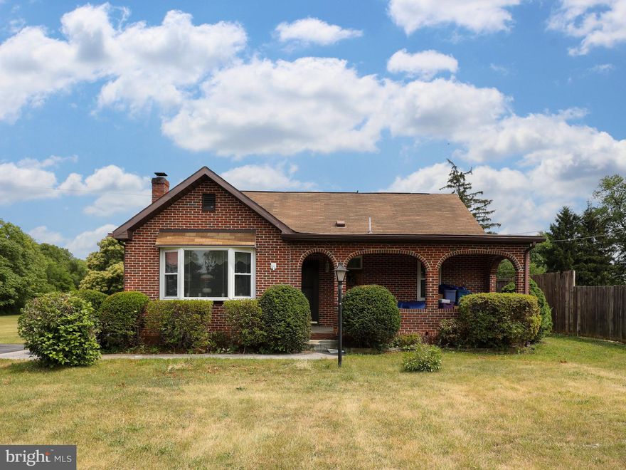 Pristine All Brick Home situated on 1.03 Acres in convenient location of Inwood.  This property is made up of two separate parcels.  The Home is on .60 acres with an adjoining  .43 acre parcel to do with as you please.  You could chose to build on this lot OR keep  to enjoy the more spacious lot as the present owner does.   Home has been very well maintained and Chock Full of Charm.   Main level offers 3 Bedrooms and 1 full Bath; Ample Family Room, Dining and Kitchen Area.   Seller says there may be hardwoods under carpet.  Home is flanked on front, rear and side with generous porches.  Rear porches include a completely enclosed porch with baseboard heat to enjoy all year round and flows to screened area.    Side porch offers a cool breeze to enjoy the warmest days of summer.   Attic is completely finished and has been used as a bedroom. Attic is served by a window unit for cooling & electric baseboard heat.  And there is a Full Basement that is perfect for Storage.    Outside find a Nicely Size Workshop  with Electric Service and Propane heat and a second shed perfect or mower, garden equipment & additional storage.  Flat yard is perfect for a garden!  This home is being sold as/is with no known defects.  Seller needs 60 day rent back AFTER closing.  Purchaser to verify schools. Comcast available.