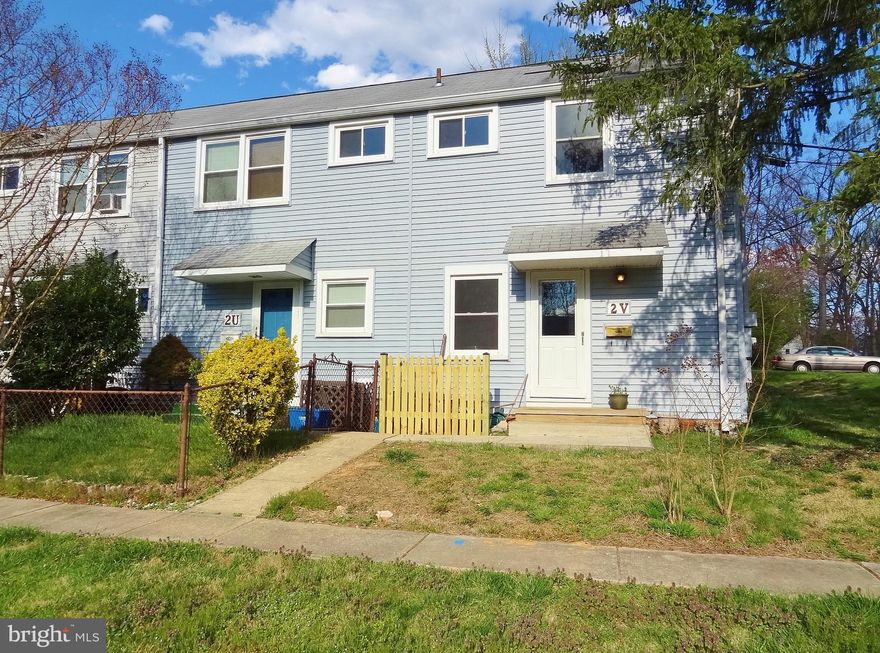 Great value in this two bedroom townhome on CORNER LOT in original Greenbelt.  Refinished Oak hardwood flooring on both levels.  Freshly painted throughout.  NEW stove and all-in-one washer/dryer unit included. Modern thermal-pane windows and insulated front and back doors. Reserved parking space immediately adjacent to backyard.  The city sidewalk network leads to Roosevelt Center - groceries, theater, aquatic & community centers, restaurants, salons, bakery, banking & more.  Enjoy Greenbelt Lake, Buddy Attick Park, tennis courts, ballfields, playgrounds and lots of other recreational opportunities. Total of $712.80 includes all TAXES, insurance, trash pickup, renovation program, replacement reserves & most structural maintenance. (walls, roof, wiring, plumbing, hot water heater & more.)