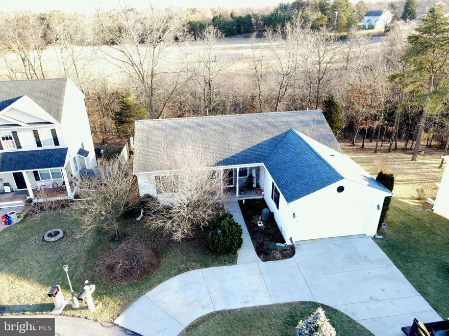 This exceptional property is a perfect blend of elegance and comfort, offering everything you need for a harmonious lifestyle. Spacious and thoughtfully designed, this home is ideal for families or entertaining guests. Cozy up during the colder months with a charming fireplace in the dining area, perfect for creating a warm and inviting atmosphere. The upgraded kitchen features stainless steel appliances, granite countertops, and opens seamlessly to the dining and living room for that expansive, open-concept feel. Ideal for those who love to host. 
The full basement features a large area for family gatherings and an entertainment room, providing endless possibilities for fun and relaxation. The lower level also includes a plethora of space for storage, along with a large cedar closet for stowing away sensitive valuables. 
Enjoy a large, fenced backyard bordering a natural environment. Perfect for relaxation and outdoor activities. The maintenance-free composite and vinyl deck offers a wonderful space to unwind and take in the serene surroundings.
Located in a peaceful and friendly neighborhood, 134 Lair Way offers both tranquility and convenience, being close to local amenities and easy access to major routes. Come and see if this beautiful property is the perfect place for you to call home!