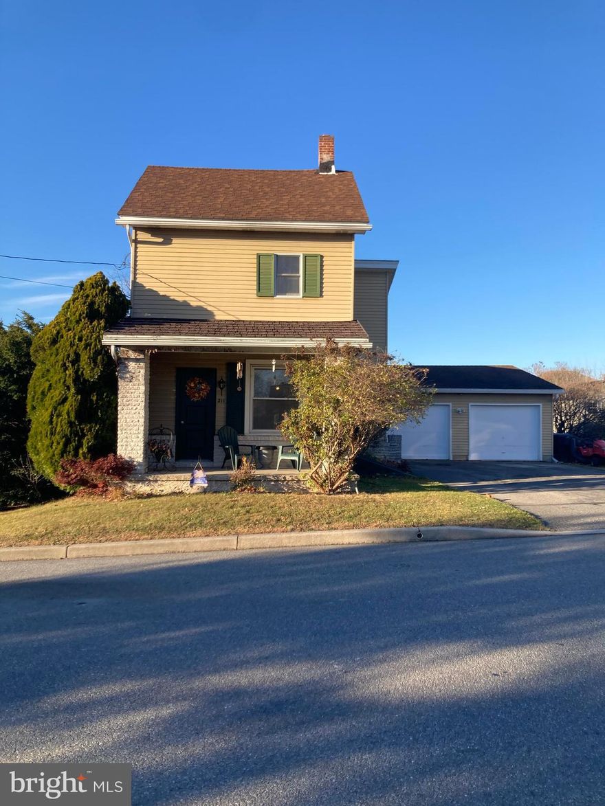 This three bedroom home is an absolute must see!! Curl up with a good book by the fire of the propane stove on the cold winter night or host your family's next holiday party in the large dining room. Plenty of living space, room for a home office, and a great back yard. Nice sized shed with electric! Lots of parking space in the over sized one car garage and large driveway