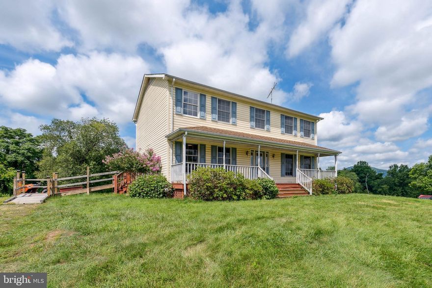 SEARCH NO MORE !!  You've found a gem that's waiting for your polish.  PLUS...  Seller will pay up to 4% of YOUR closing costs - so you can save your money, or, use it toward your own decorator finishing touches!  This impressive 3 level colonial home with country porch is situated on 5.0 acres in a small, quiet and private enclave of homes called "Lake Athlone Estates" - complete with access to the lake for recreational purposes, including non-motor boating.  Located just minutes away from shopping and I-66.  Wonderful open concept eat in kitchen - family room with french doors to an adjoining deck.  In addition to two full baths on the upper level, this home boasts a main level full bath with shower off of the mud room... and... another full bath in the full, day-lite, ground level walkout basement.  Basement foundation has extra course(s) of block that provide a higher than normal ceiling height.   Two brick fireplaces - one in the family room and one in the basement with a wood stove insert.   Tucked in the private back yard is a secure workshop / garage combo and a separate multi-purpose building.  HVAC updated in 2022.  Horses & cattle permitted - see "Covenants" in attached docs for complete details.  See all of the photo descriptions for room-by-room details.