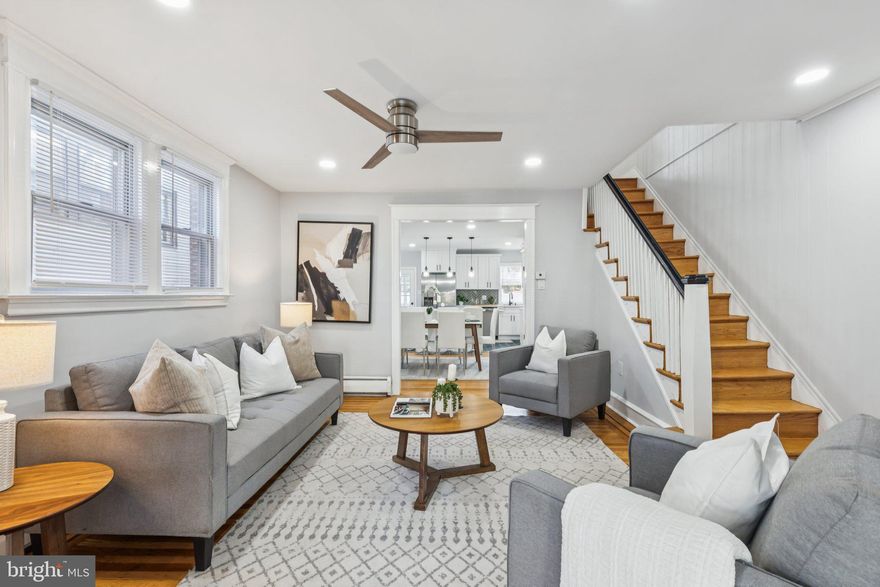 Step inside this newly renovated home, where original oak hardwood floors with walnut inlay set a warm and classic tone. The sunroom at the front of the house features wide windows that fill the space with natural light and connect seamlessly to the main living room. From there, the layout flows into the dining room and updated kitchen. The kitchen offers a large island with seating and storage, quartz countertops, shaker-style cabinetry, and stainless steel appliances. Just off the kitchen is a deep storage closet, and toward the rear you’ll find a mudroom with access to the spacious backyard—an ideal setup for grilling, relaxing, or outdoor gatherings.
Upstairs, original hardwood floors extend through three well-sized bedrooms. Each room has generous windows that brighten the entire level. The full hallway bathroom features modern tilework, a wide vanity with storage, and a linen closet. A hall cedar closet provides even more storage options.
Downstairs, the finished basement offers durable LVP flooring, plenty of room for additional storage or flex use, and a half bathroom. A rear door leads to bilco doors for easy access to the yard.
Out front, a long shared driveway leads to a detached one-car garage, plus additional parking in the driveway.
Located in the heart of Drexel Hill, you are close to a Trolley Line, coffee shops, and restaurants. Schedule your tour today!