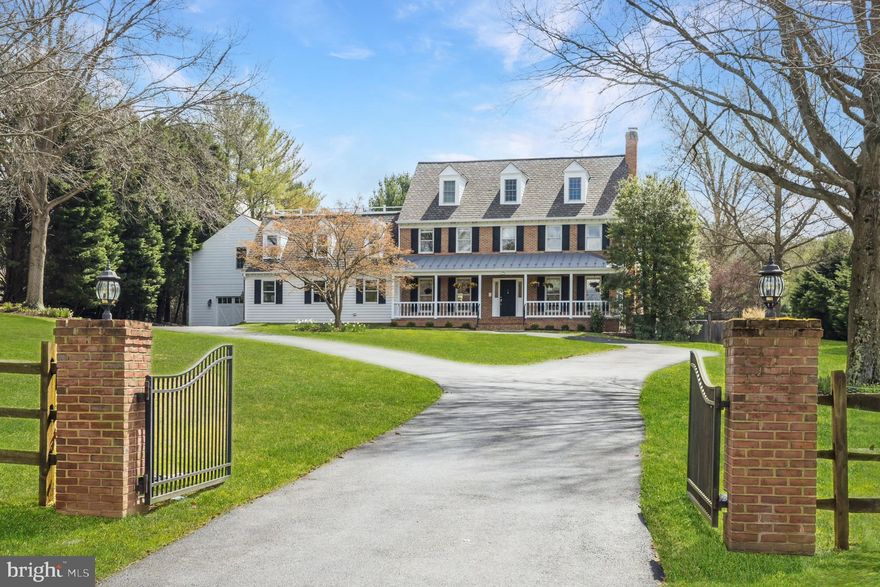 1ST OPEN Saturday 4/6,  2-4PM & Sunday 4/7,  1-4PM. Nestled on three acres in the heart of Belvedere, this stunning custom residence has been renovated and expanded to perfection, offering the perfect balance of formal and informal living spaces within a framework of classic architectural style. The European-inspired interior is enhanced with gorgeous millwork, exposed brick, designer lighting, and built-in furnishings that elevate the concept of form and function to a new level. The outdoors is seamlessly blended into the fabric of the home, which offers 4 bedrooms, a bonus room, 5 full baths, and every option for living, entertaining, professional pursuits and leisure. The main level features a large office with built-ins, a formal living room, an expansive great room with one of the home’s 4 fireplaces, and the kitchen of any chef’s dreams.  Outfitted with custom Wood Mode cabinetry, a handmade range hood, professional series appliances and a glossy ship-lapped ceiling, the spacious kitchen offers island seating for five yet retains a warm and inviting character.  A sunlit breakfast/dining room is adjacent, and the main level also features a mudroom with cabinets and lockers…even a custom pet washing station.  For the fitness enthusiast, the expansive turf-floored home gym will not disappoint! Part of the genius of the design in this home is the flexibility of the living space.  So accommodating for a large or multi-generation household, the private spaces are incredible.  There is a wing with a homework/reading area and 4 bedrooms on the upper level.  The primary suite includes beautiful built-ins, a fireplace, a renovated bath and access to a deck overlooking the bucolic rear grounds.  The other bedrooms all possess a personality of their own; from the triple-dormered space with window seating to the delightful bedroom with deck access.  All 5 baths in the home have been renovated with exquisite tilework and state-of-the-art fixtures.  The walk-out lower level has been masterfully updated to the same standards; the lounge area features a custom bar and a “candy wall” shelving system, the movie room is complete with built-in technology storage, and the game nook invites friendly competition to go on for hours!  Step outside to a private outdoor oasis, which includes a covered patio with a grill, a fabulous new saltwater pool and extra large hot tub, a paved walking path, and a level lawn that could easily accommodate the most luxurious pool house. Implementing every amenity for the modern lifestyle, the owners added laundry facilities on two levels, automatic lighting, electronic window treatments, precision temperature controls, and 4 energy efficient HVAC systems. Brimming with timeless old-world character while offering state-of-the-art livability, this home is truly extraordinary!