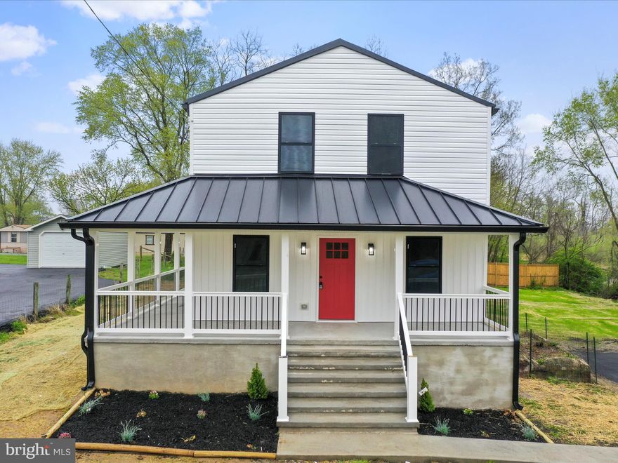 Wow!! Beautifully remodeled home from top to bottom. Home is basically new construction. All exterior work including vinyl siding, new concrete poured wrap around porch, even the grass is newly seeded. Inside you will see a beautiful open layout kitchen with soft close cabinetry and  stainless steel appliances. This first floor also offers a main level master bedroom and a great laundry room. Upstairs you have 3 more bedrooms and another full bathroom. This upstairs has a 2nd living room as well. Take a look around this home you will appreciate the 10 foot ceilings as well as the tastefully decorated fixtures, lighting, faucets all brand new and all done with professional work.